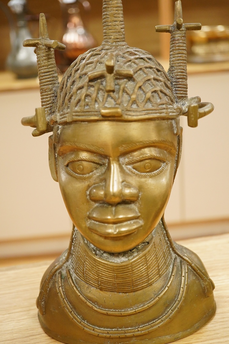 Three Benin type bronzes to include a bust, largest 47cm high